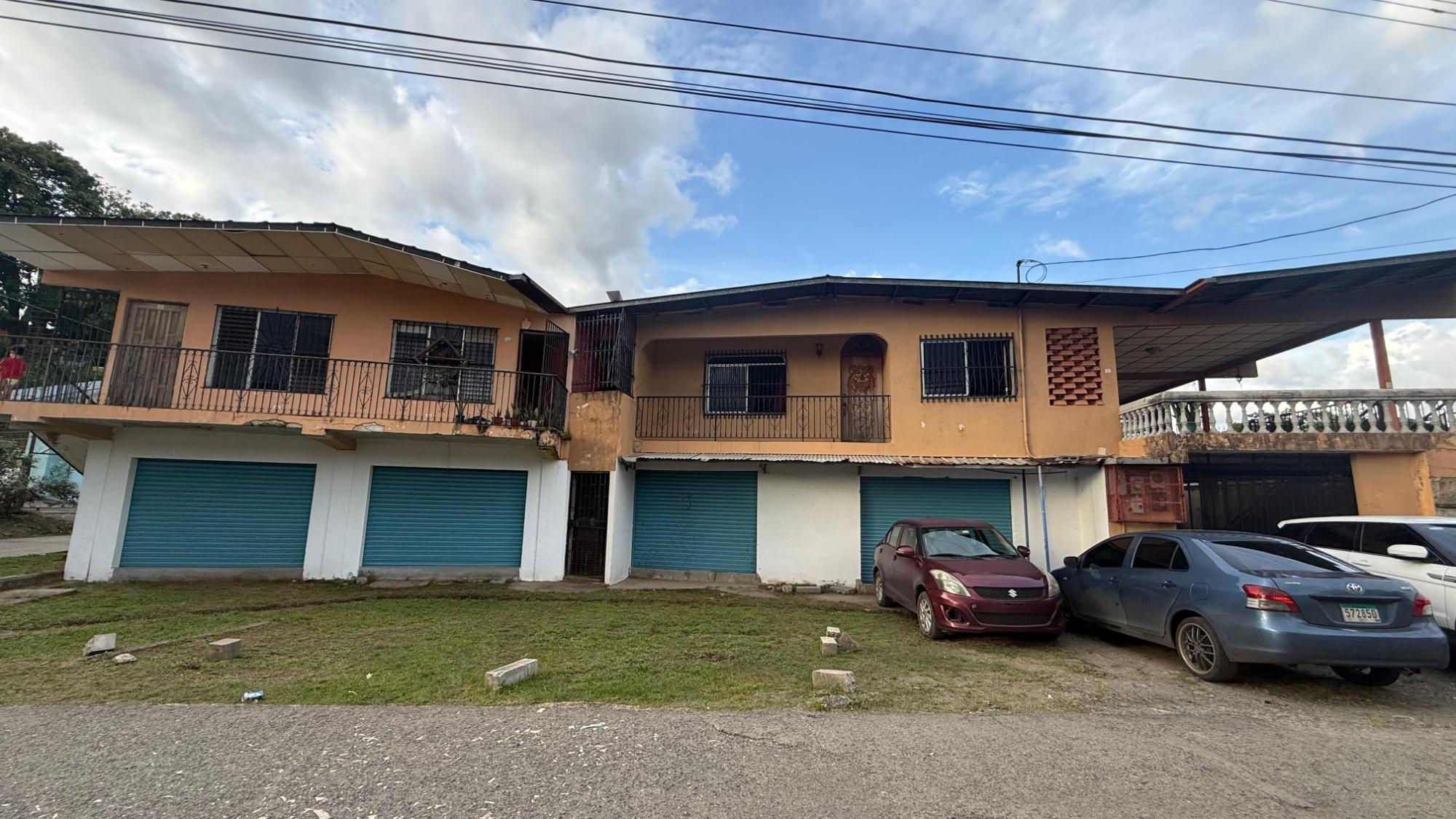 SALE OF 2 HOUSES AND 2 COMMERCIAL PREMISES