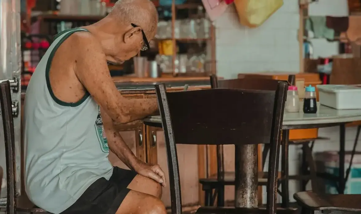 old man sitting restaurant